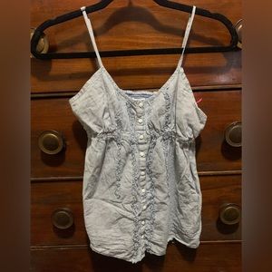 Ruffles going down the front and the back has stretchy material